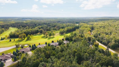 Welcome to this 3-bedroom, 2-bath home in the desirable Michaywe on Michaywe Pines Course in Michigan - for sale on GolfHomes.com, golf home, golf lot