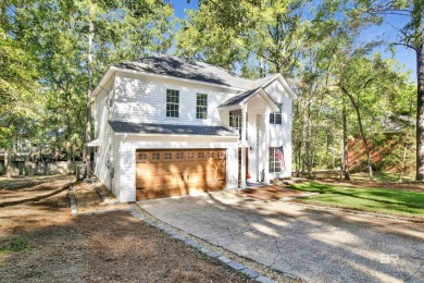 This stunning 3-bedroom, 2-bath home, located in the heart of on Lake Forest Yacht and Country Club in Alabama - for sale on GolfHomes.com, golf home, golf lot