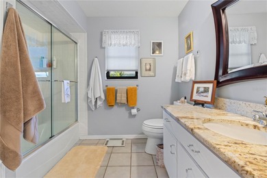 WATERFRONT HOME IN PGI W/**NEW TILE ROOF** & NEARLY INSTANT on Saint Andrews South Golf Club in Florida - for sale on GolfHomes.com, golf home, golf lot