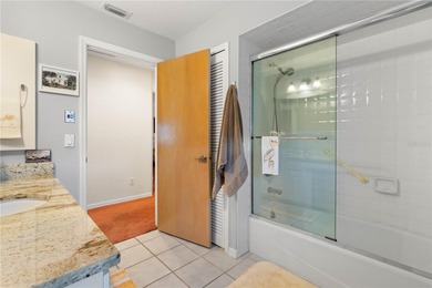 WATERFRONT HOME IN PGI W/**NEW TILE ROOF** & NEARLY INSTANT on Saint Andrews South Golf Club in Florida - for sale on GolfHomes.com, golf home, golf lot