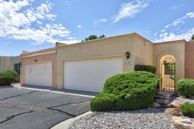 This lovely townhome in sought after Chimney Ridge sits directly on Arroyo Del Oso Golf Course in New Mexico - for sale on GolfHomes.com, golf home, golf lot