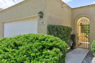 This lovely townhome in sought after Chimney Ridge sits directly on Arroyo Del Oso Golf Course in New Mexico - for sale on GolfHomes.com, golf home, golf lot