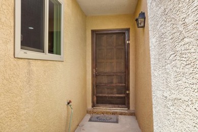 This lovely townhome in sought after Chimney Ridge sits directly on Arroyo Del Oso Golf Course in New Mexico - for sale on GolfHomes.com, golf home, golf lot