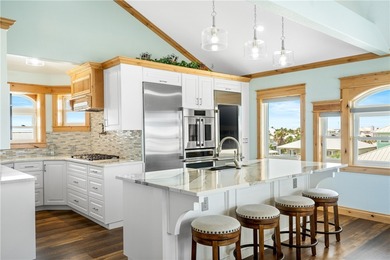 Experience the pinnacle of coastal luxury in this meticulously & on Palmilla Beach Golf Club in Texas - for sale on GolfHomes.com, golf home, golf lot