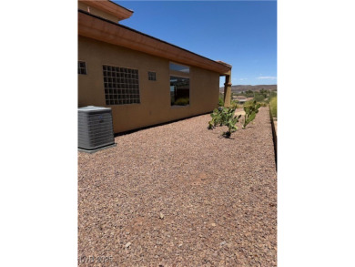 Spectacular golf and mountain views from this elevated home on on  in Nevada - for sale on GolfHomes.com, golf home, golf lot