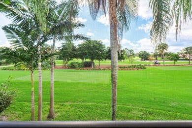 Captivating golf course & lake views grace your windows and on Quail Ridge Golf Course and Country Club in Florida - for sale on GolfHomes.com, golf home, golf lot