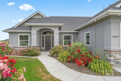 Welcome to this beautifully maintained 4 bedroom, 3 bath home on Hunters Point Golf Club in Idaho - for sale on GolfHomes.com, golf home, golf lot