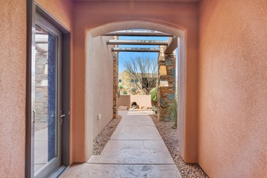 This home has stunning views of Kachina Cliffs, the Entrada Golf on Entrada at Snow Canyon in Utah - for sale on GolfHomes.com, golf home, golf lot