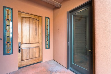 This home has stunning views of Kachina Cliffs, the Entrada Golf on Entrada at Snow Canyon in Utah - for sale on GolfHomes.com, golf home, golf lot