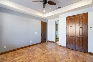 This home has stunning views of Kachina Cliffs, the Entrada Golf on Entrada at Snow Canyon in Utah - for sale on GolfHomes.com, golf home, golf lot