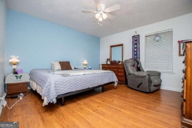 This 3-bedroom, 2-bathroom home offers modern comfort with a on Fairfield Plantation Golf and Country Club in Georgia - for sale on GolfHomes.com, golf home, golf lot