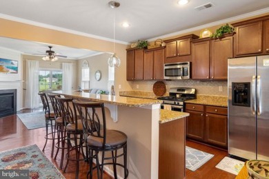 Welcome to this stunning 4-bedroom, 2.5-bathroom end unit on Plantation Lakes Golf and Country Club in Delaware - for sale on GolfHomes.com, golf home, golf lot