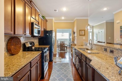 Welcome to this stunning 4-bedroom, 2.5-bathroom end unit on Plantation Lakes Golf and Country Club in Delaware - for sale on GolfHomes.com, golf home, golf lot