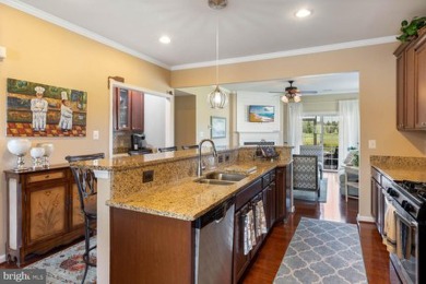 Welcome to this stunning 4-bedroom, 2.5-bathroom end unit on Plantation Lakes Golf and Country Club in Delaware - for sale on GolfHomes.com, golf home, golf lot