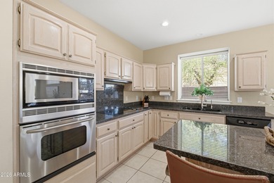 Experience resort-style living in a prime Oakwood location, just on Oakwood Golf Club  in Arizona - for sale on GolfHomes.com, golf home, golf lot