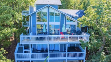 This is a heavyweight champion short term rental income producer on The Oaks Golf Course in Missouri - for sale on GolfHomes.com, golf home, golf lot