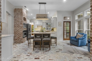 This beautifully appointed 3-bedroom, 2.5-bath home is the on Diamondhead Country Club in Mississippi - for sale on GolfHomes.com, golf home, golf lot