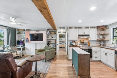 Charming and updated home with a modern farmhouse feel, offering on Forest Hills Golf Course in Florida - for sale on GolfHomes.com, golf home, golf lot