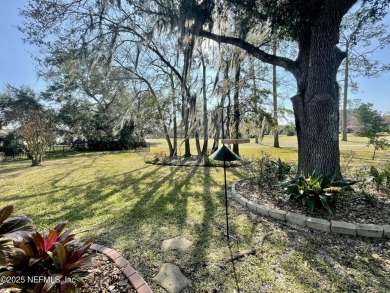 Enjoy your views of the Magnolia Point Golf course from this on Magnolia Point Golf and Country Club in Florida - for sale on GolfHomes.com, golf home, golf lot