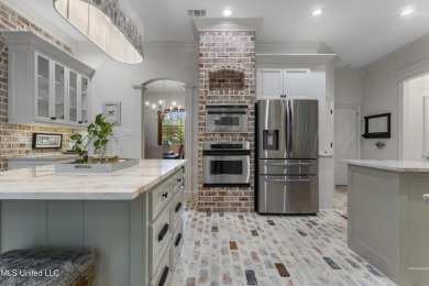 This beautifully appointed 3-bedroom, 2.5-bath home is the on Diamondhead Country Club in Mississippi - for sale on GolfHomes.com, golf home, golf lot