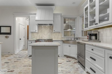 This beautifully appointed 3-bedroom, 2.5-bath home is the on Diamondhead Country Club in Mississippi - for sale on GolfHomes.com, golf home, golf lot