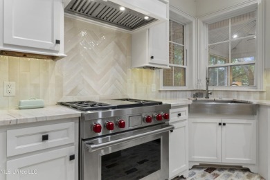 This beautifully appointed 3-bedroom, 2.5-bath home is the on Diamondhead Country Club in Mississippi - for sale on GolfHomes.com, golf home, golf lot