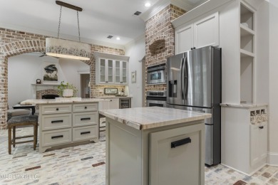 This beautifully appointed 3-bedroom, 2.5-bath home is the on Diamondhead Country Club in Mississippi - for sale on GolfHomes.com, golf home, golf lot
