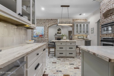 This beautifully appointed 3-bedroom, 2.5-bath home is the on Diamondhead Country Club in Mississippi - for sale on GolfHomes.com, golf home, golf lot