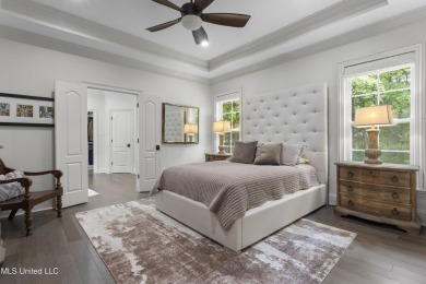 This beautifully appointed 3-bedroom, 2.5-bath home is the on Diamondhead Country Club in Mississippi - for sale on GolfHomes.com, golf home, golf lot