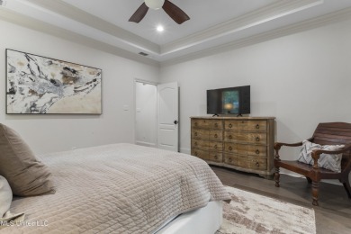 This beautifully appointed 3-bedroom, 2.5-bath home is the on Diamondhead Country Club in Mississippi - for sale on GolfHomes.com, golf home, golf lot