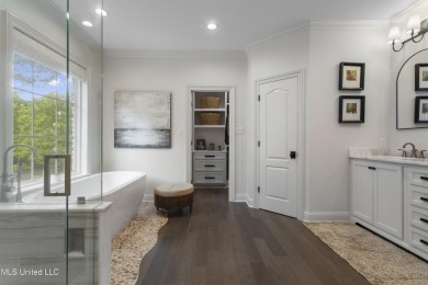 This beautifully appointed 3-bedroom, 2.5-bath home is the on Diamondhead Country Club in Mississippi - for sale on GolfHomes.com, golf home, golf lot