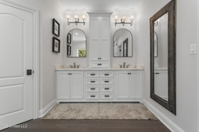 This beautifully appointed 3-bedroom, 2.5-bath home is the on Diamondhead Country Club in Mississippi - for sale on GolfHomes.com, golf home, golf lot