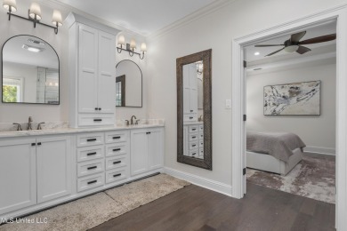 This beautifully appointed 3-bedroom, 2.5-bath home is the on Diamondhead Country Club in Mississippi - for sale on GolfHomes.com, golf home, golf lot