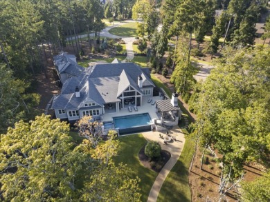 Welcome to this breathtaking waterfront retreat, where luxury on Reynolds Lake Oconee - The Oconee in Florida - for sale on GolfHomes.com, golf home, golf lot