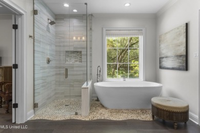 This beautifully appointed 3-bedroom, 2.5-bath home is the on Diamondhead Country Club in Mississippi - for sale on GolfHomes.com, golf home, golf lot