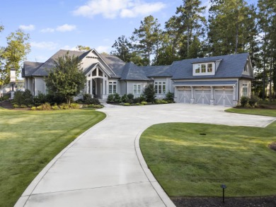Welcome to this breathtaking waterfront retreat, where luxury on Reynolds Lake Oconee - The Oconee in Florida - for sale on GolfHomes.com, golf home, golf lot