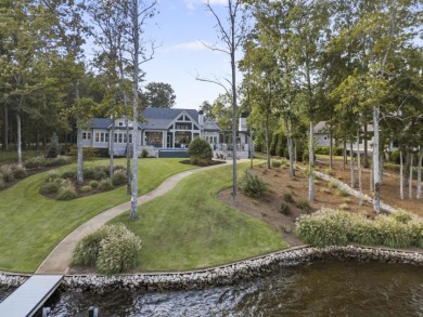 Welcome to this breathtaking waterfront retreat, where luxury on Reynolds Lake Oconee - The Oconee in Florida - for sale on GolfHomes.com, golf home, golf lot