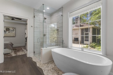 This beautifully appointed 3-bedroom, 2.5-bath home is the on Diamondhead Country Club in Mississippi - for sale on GolfHomes.com, golf home, golf lot