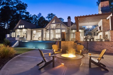 Welcome to this breathtaking waterfront retreat, where luxury on Reynolds Lake Oconee - The Oconee in Florida - for sale on GolfHomes.com, golf home, golf lot