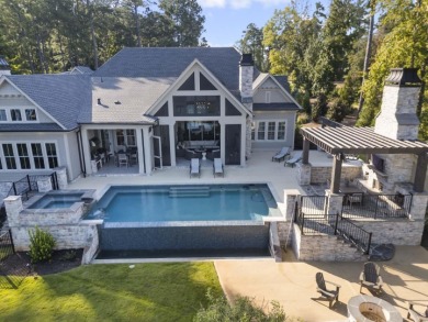 Welcome to this breathtaking waterfront retreat, where luxury on Reynolds Lake Oconee - The Oconee in Florida - for sale on GolfHomes.com, golf home, golf lot