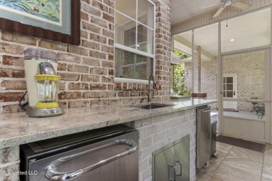 This beautifully appointed 3-bedroom, 2.5-bath home is the on Diamondhead Country Club in Mississippi - for sale on GolfHomes.com, golf home, golf lot