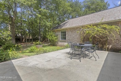 This beautifully appointed 3-bedroom, 2.5-bath home is the on Diamondhead Country Club in Mississippi - for sale on GolfHomes.com, golf home, golf lot