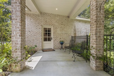 This beautifully appointed 3-bedroom, 2.5-bath home is the on Diamondhead Country Club in Mississippi - for sale on GolfHomes.com, golf home, golf lot