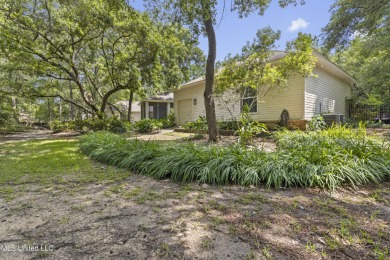 This beautifully appointed 3-bedroom, 2.5-bath home is the on Diamondhead Country Club in Mississippi - for sale on GolfHomes.com, golf home, golf lot