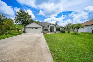 Nestled on an oversized corner lot, and features NEW ROOF 2022 on Bobcat Trail Golf Club in Florida - for sale on GolfHomes.com, golf home, golf lot