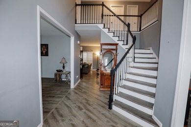 Welcome home to 116 Eastlake Landing, nestled in the highly on Summergrove Golf Club in Georgia - for sale on GolfHomes.com, golf home, golf lot