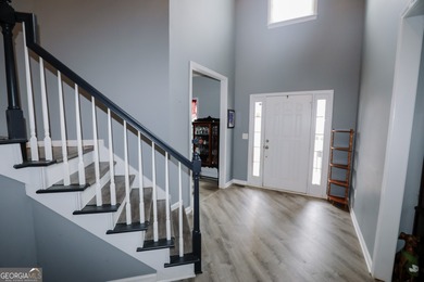 Welcome home to 116 Eastlake Landing, nestled in the highly on Summergrove Golf Club in Georgia - for sale on GolfHomes.com, golf home, golf lot