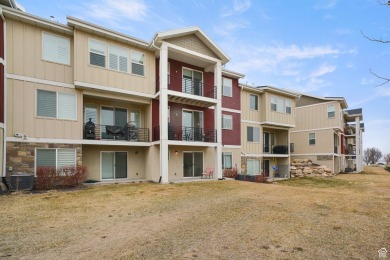 This stunning townhome, nestled against the picturesque Talons on Talons Cove Golf Club in Utah - for sale on GolfHomes.com, golf home, golf lot