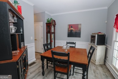 Welcome home to 116 Eastlake Landing, nestled in the highly on Summergrove Golf Club in Georgia - for sale on GolfHomes.com, golf home, golf lot