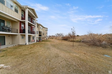 This stunning townhome, nestled against the picturesque Talons on Talons Cove Golf Club in Utah - for sale on GolfHomes.com, golf home, golf lot